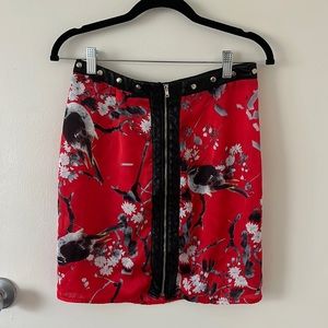 Red skirt with faux leather trimming